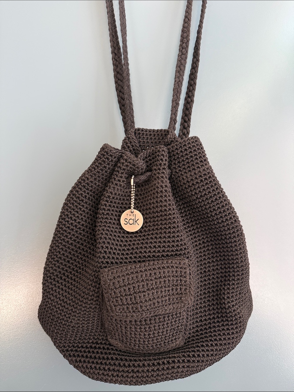 The Sak black Crochet Drawstring Backpack